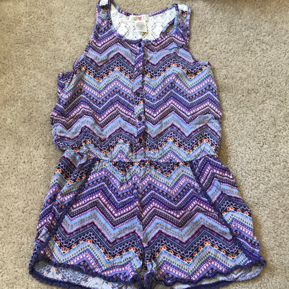 Girls purple romper, worn a few times.